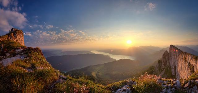 Panoramic view of mountains against sky during sunset